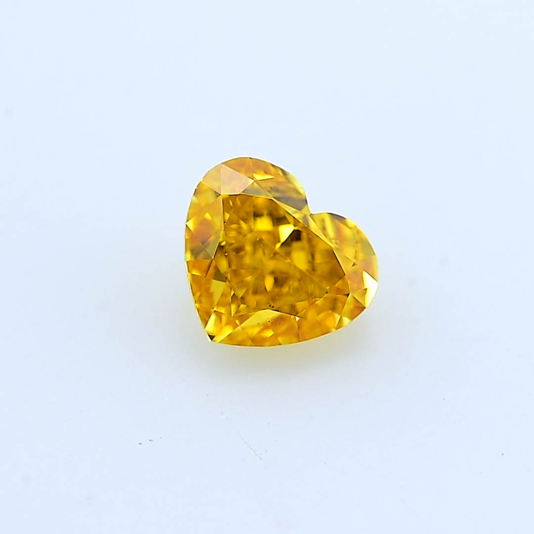 0.51 carat, Fancy Vivid Yellow Orange Diamond, Heart Shape, VS2 