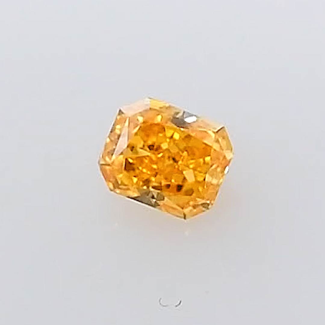 0.37 carat, Fancy Vivid Yellow Orange Diamond, Radiant Shape, VS1 