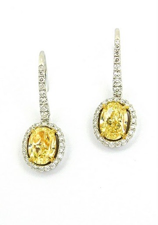 Fancy Light Yellow Oval Drop Diamond Earrings set in 18K White and Yellow Gold., SKU P5033 (3.54Ct TW)