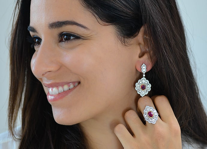 A set of ruby earrings and a ruby ring