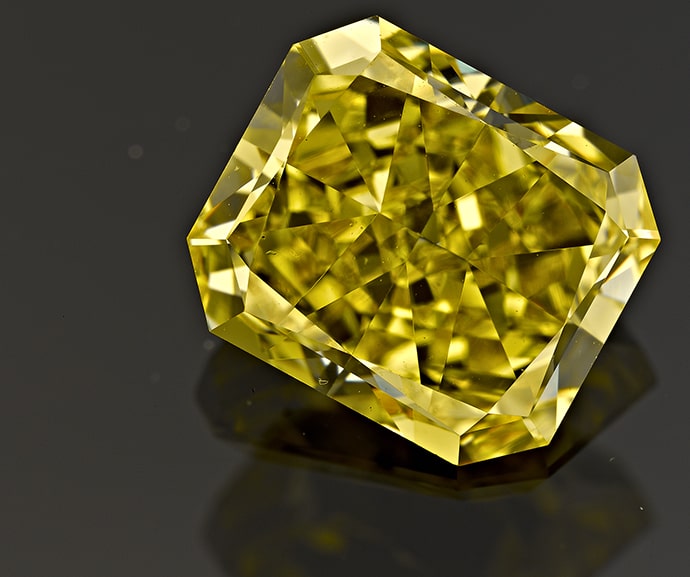A beautiful close up of a natural fancy vivid yellow diamond