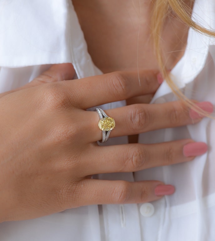 Batel in a Fancy Yellow Oval Diamond Diamond Ring