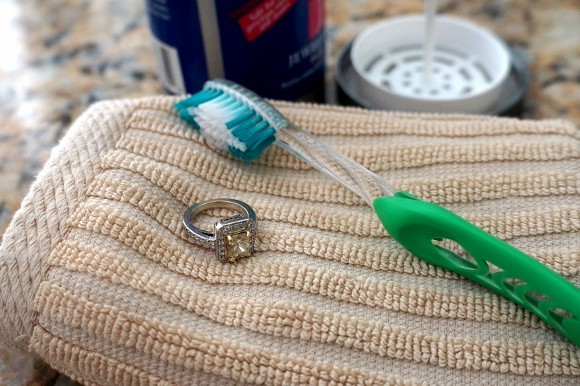 toothbrush and soap to clean diamonds
